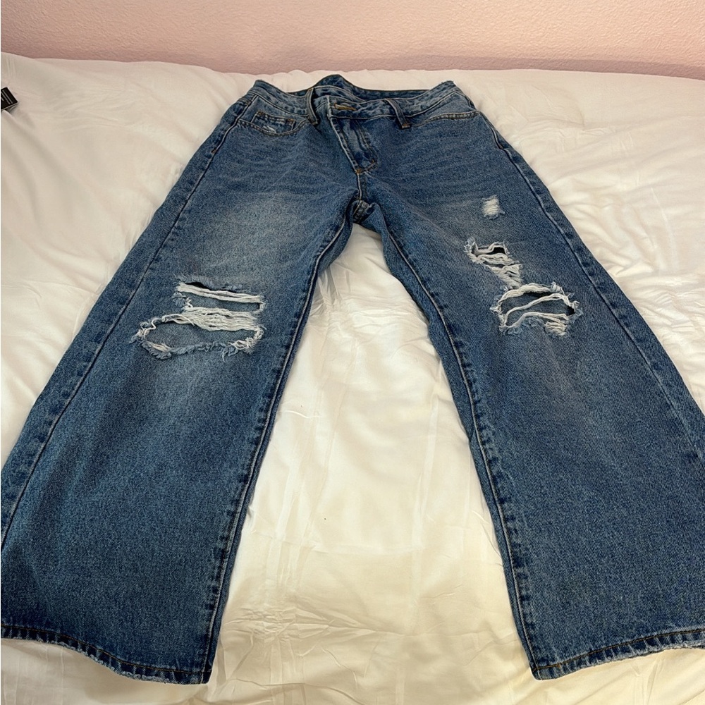 blue ripped baggy jeans